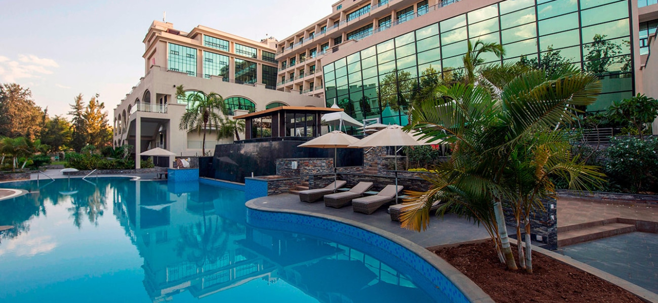 Kigali Marriott Hotel offers luxury rooms and suites, fine dining, a spa, outdoor pool, and convenient access to Kigali's business district and major attractions.